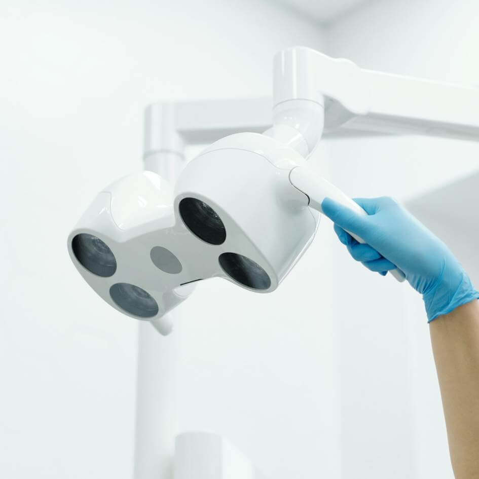 adjusting lamp during an oral cancer screening